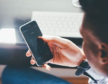 man with mobile device